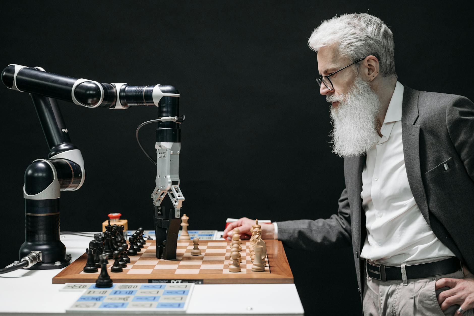 https://www.pexels.com/photo/a-bearded-man-playing-chess-8438922/