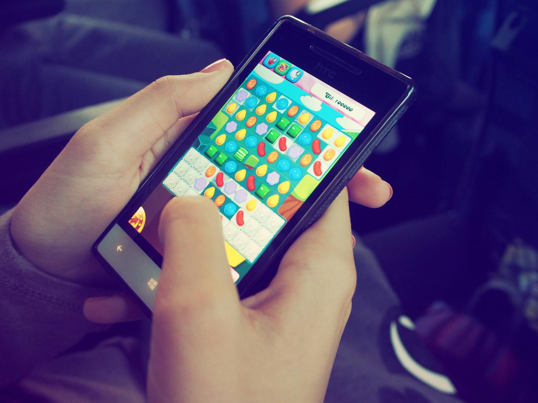 https://www.pexels.com/photo/person-playing-candy-crush-on-nokia-smartphone-228963/